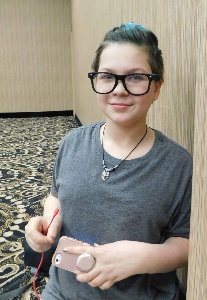 person smiling with glasses
