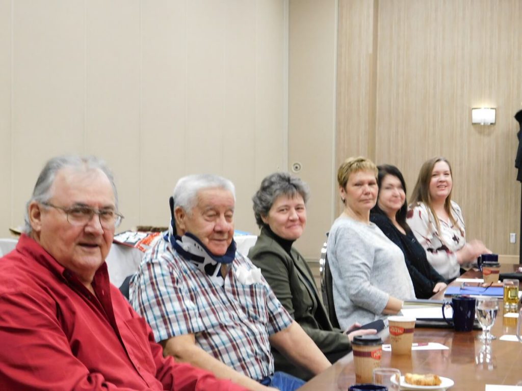 Side shot of Elders and Staff. From left to right: Man, Gary, Woman, Tracy, Woman, Woman