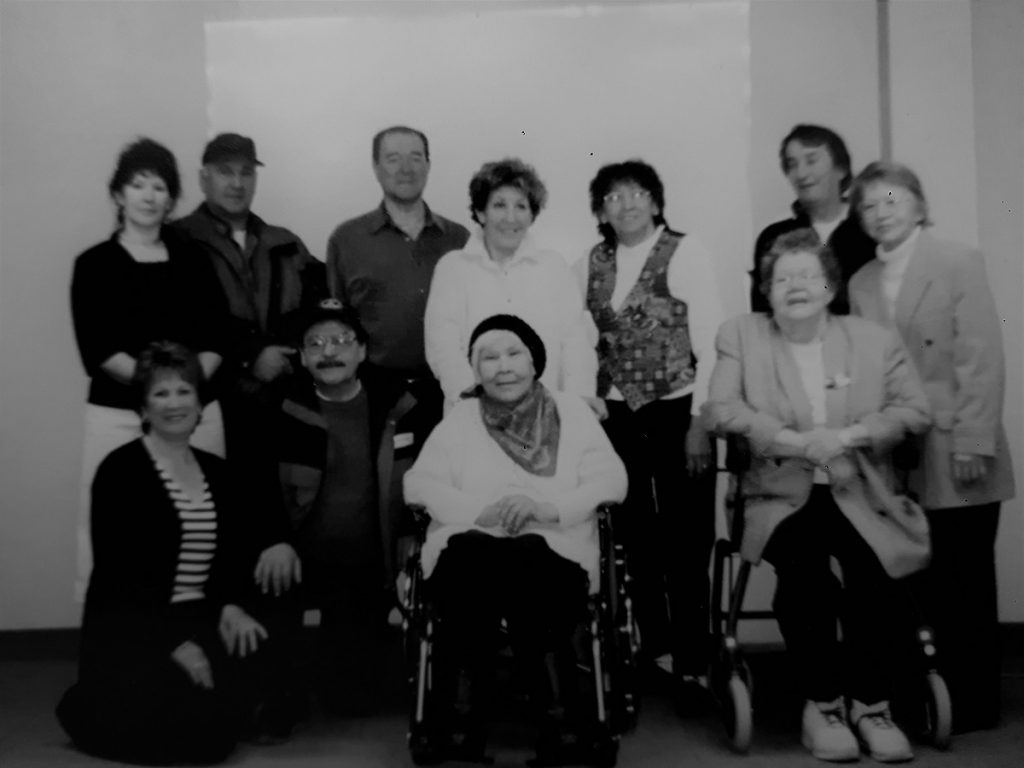 black and white elders image. Top row: Vera, Peter, Bill, Annette, Bernadette, Joe, and Madeline. Bottom row: Ellen, Victor, Elizabeth, and Hilda