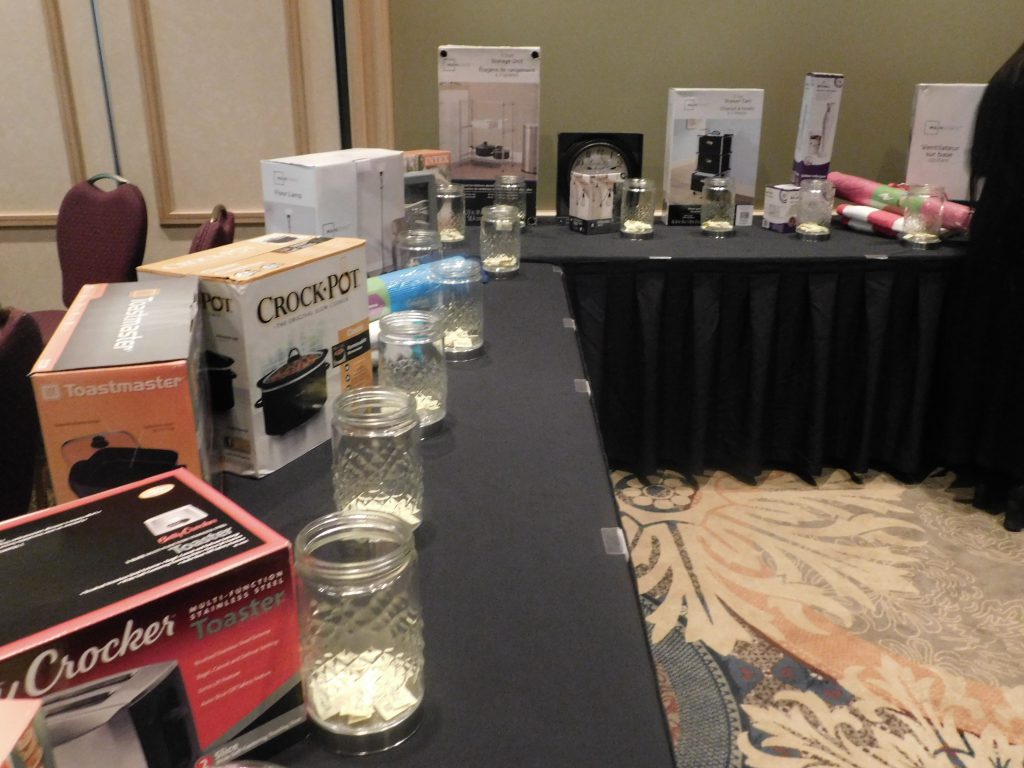 Items with jars at a table for a prize giveaway