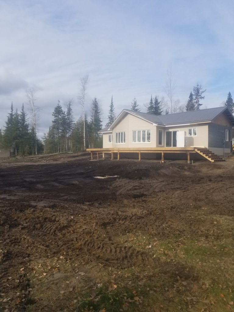 Siding complete on front of house